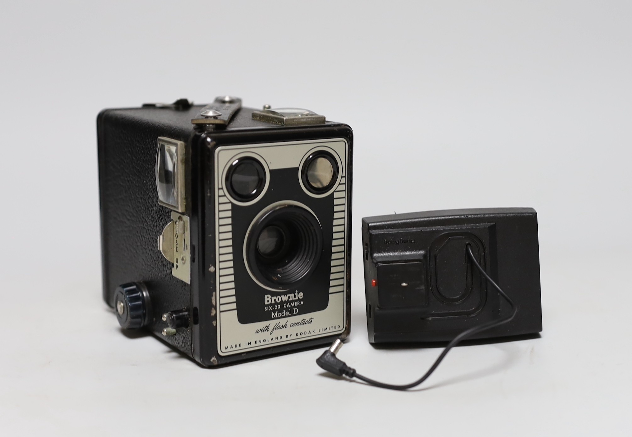 Three cameras, two cased plus a flash and light meter